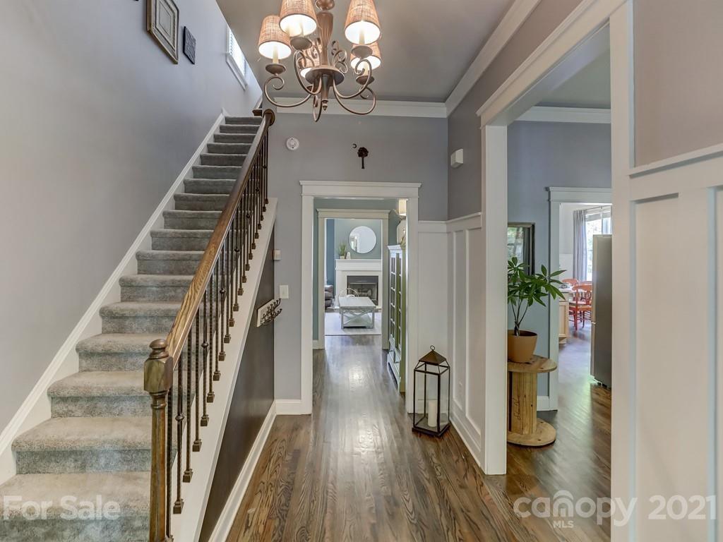 3035 Colonel Springs Way Fort Mill, SC 29708 - Photo 8 of 48 a view of a hallway with wooden floor and staircase
