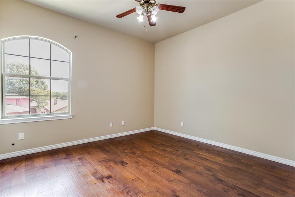 12364 Halima Street Dallas, TX 75243 - Photo 25 of 30 Wood-finish flooring with white trim