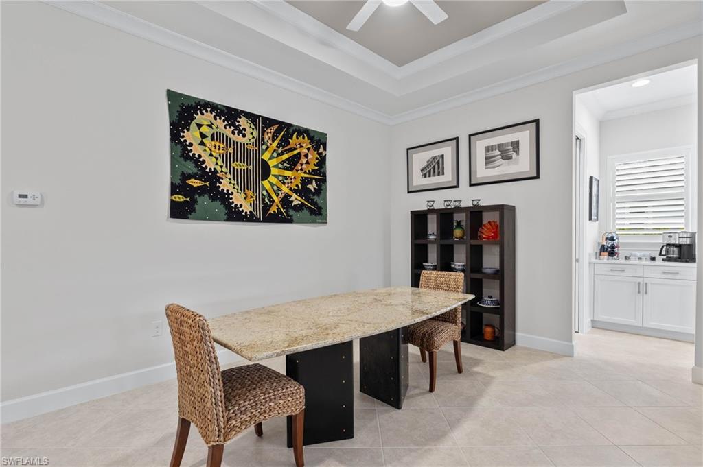 5797 Anegada Drive Naples, FL 34113 - Photo 14 of 40 a view of a dining room with furniture