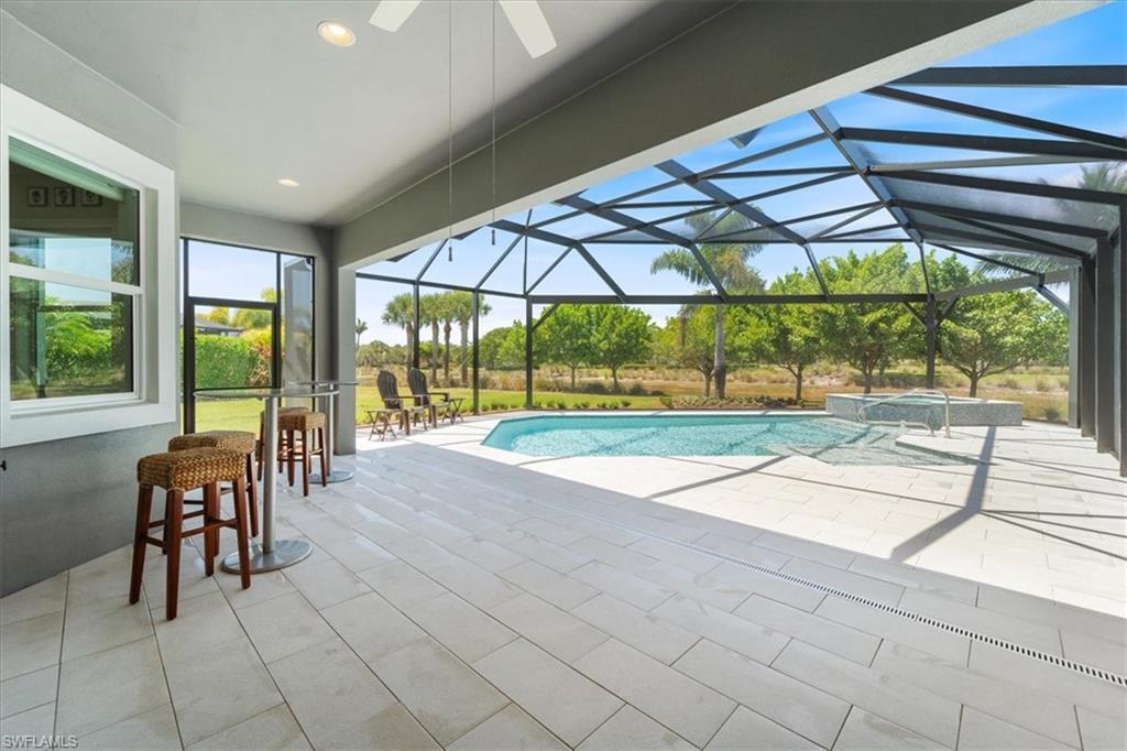 5797 Anegada Drive Naples, FL 34113 - Photo 25 of 40 a view of yard with patio