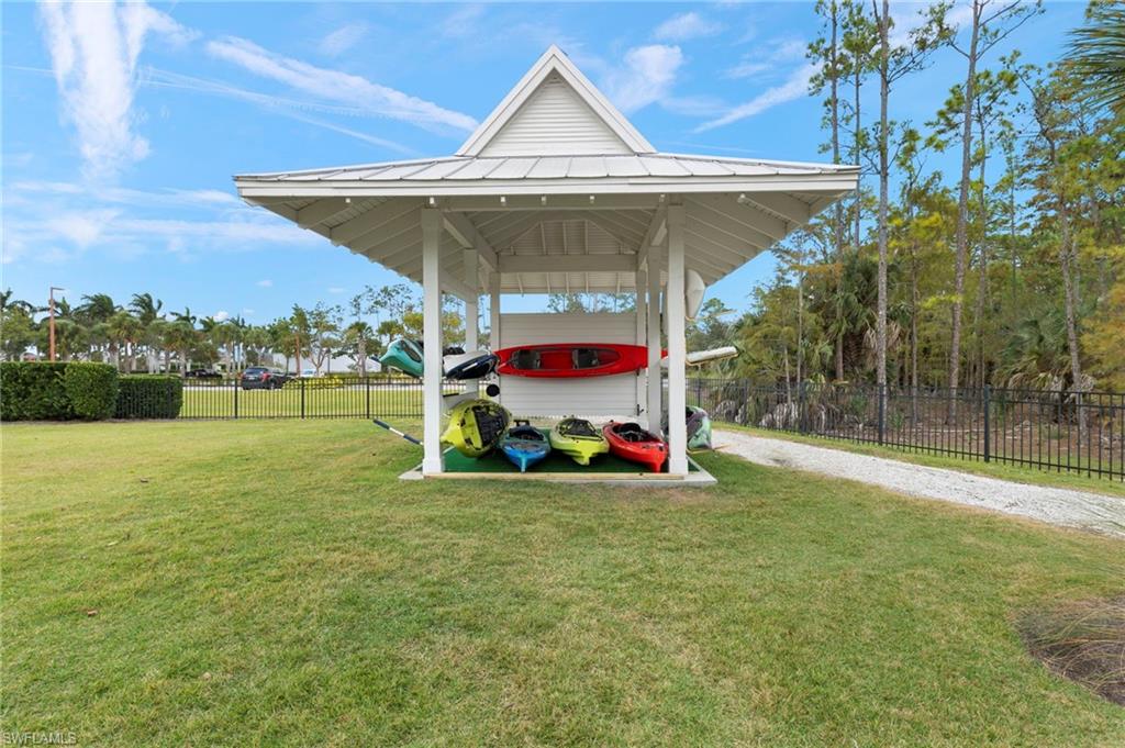 5797 Anegada Drive Naples, FL 34113 - Photo 38 of 40 a view of a house with a yard and sitting area