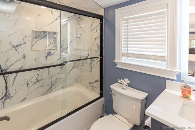 a bathroom with a sink and a bathtub