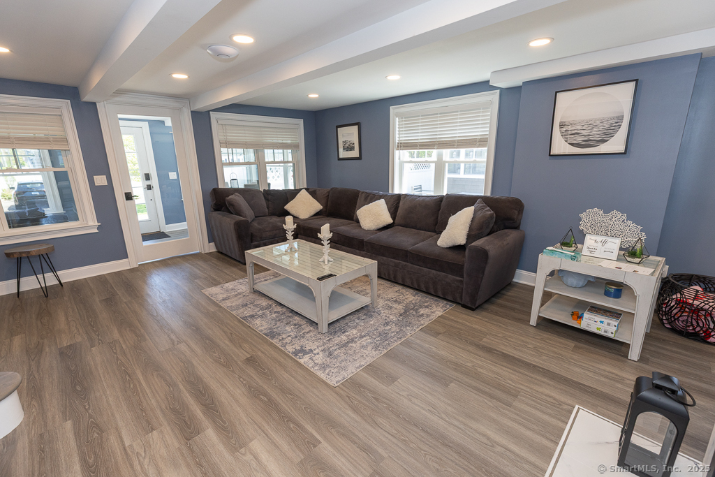 55 Swan Avenue Old Lyme, CT 06371 - Photo 18 of 40 a living room with furniture and wooden floor
