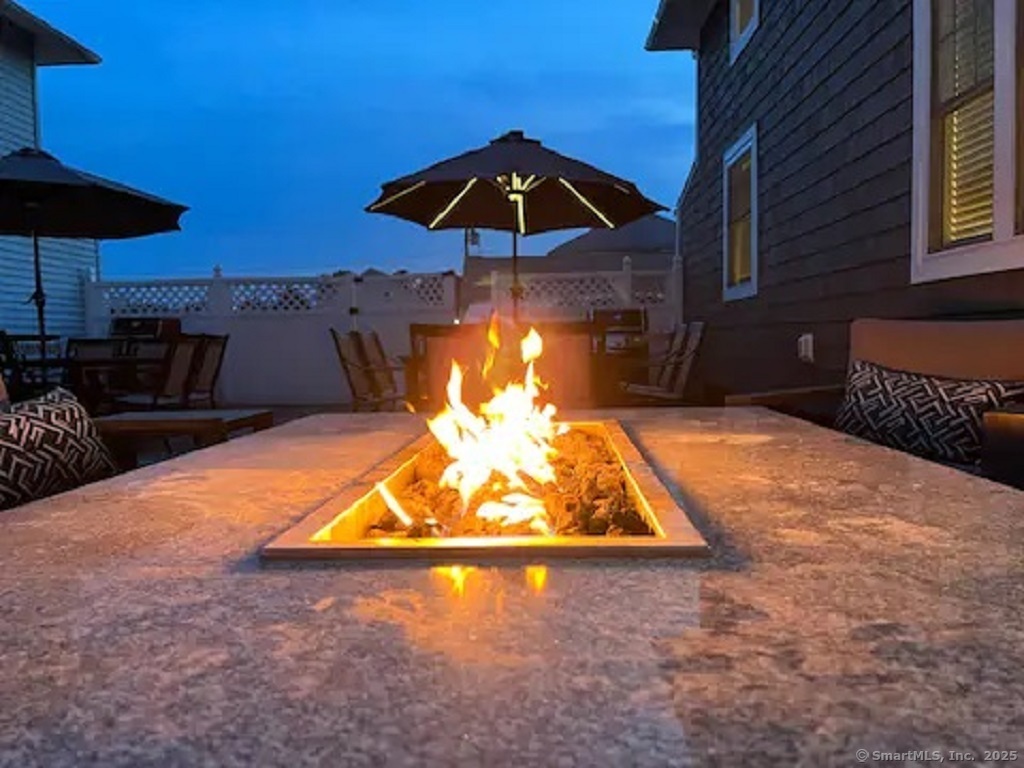 55 Swan Avenue Old Lyme, CT 06371 - Photo 34 of 40 a room with pool table and chairs