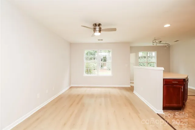 a view of a windows and an entryway in a room