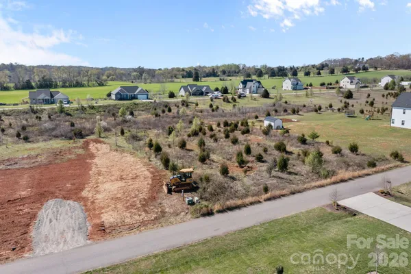 a view of a yard with mountain