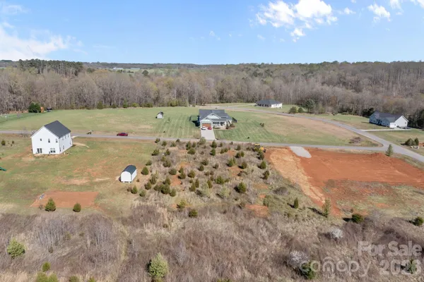 a view of a yard with an outdoor space