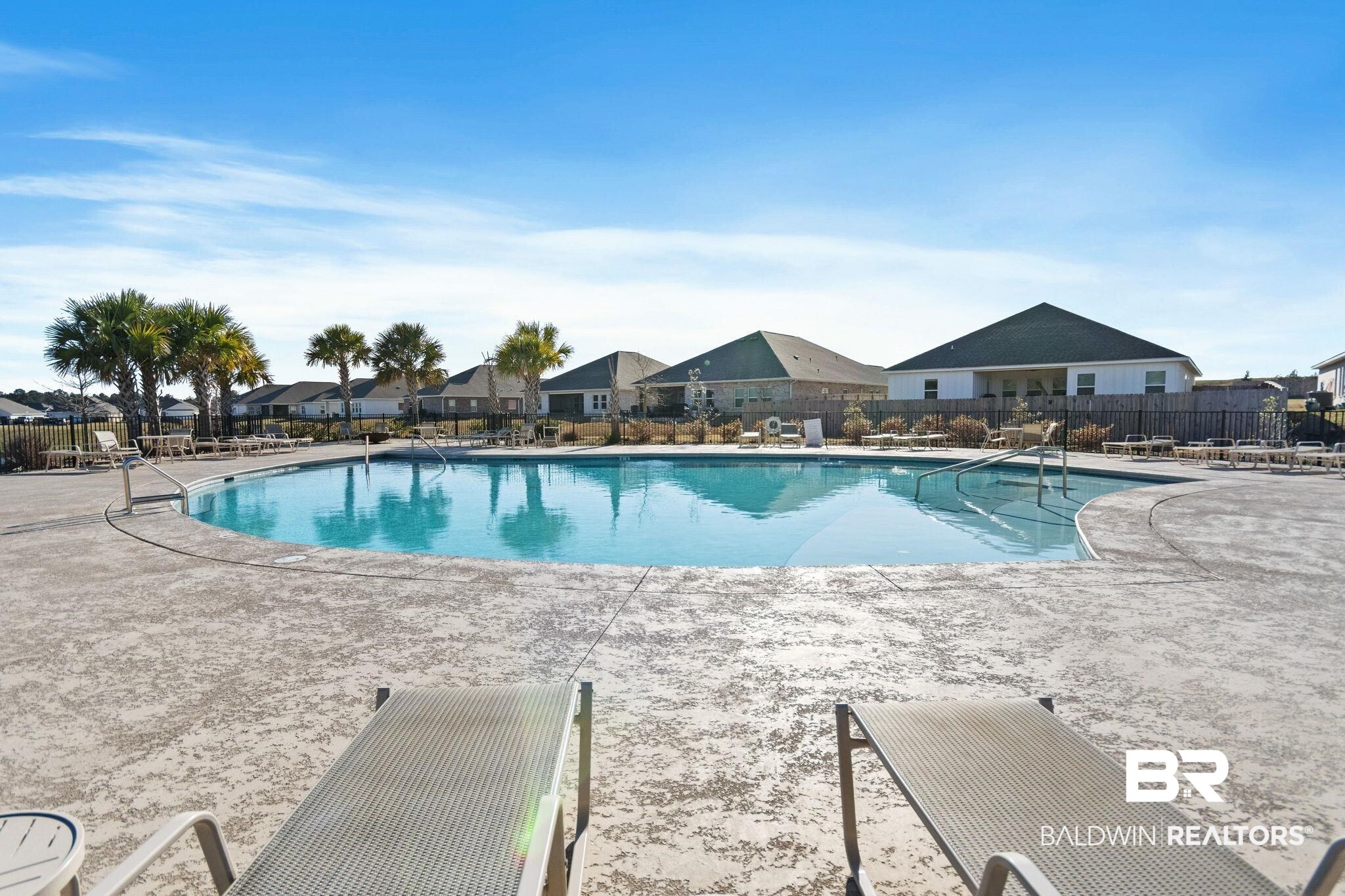 12919 Torrent Road Fairhope, AL 36532 - Photo 53 of 74 Community pool with a patio area and a residential view