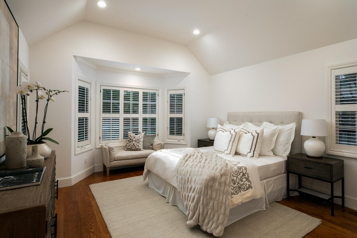 166 Seminary Drive Menlo Park, CA 94025 - Photo 17 of 41 a bedroom with a bed a flat tv screen and a dresser