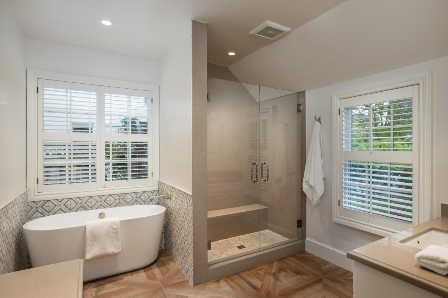 166 Seminary Drive Menlo Park, CA 94025 - Photo 18 of 41 a bathroom with a tub a sink and a shower