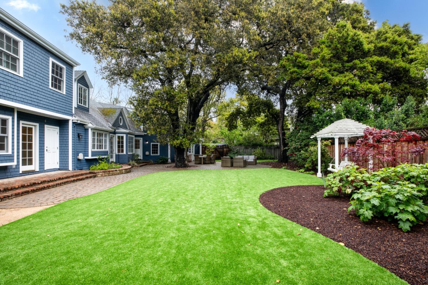 166 Seminary Drive Menlo Park, CA 94025 - Photo 34 of 41 a view of a house with a yard and sitting area