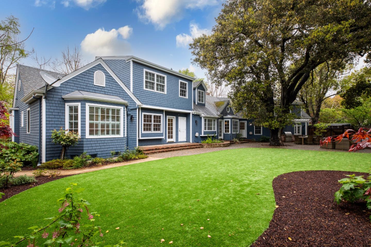 166 Seminary Drive Menlo Park, CA 94025 - Photo 35 of 41 a front view of a house with a garden and trees