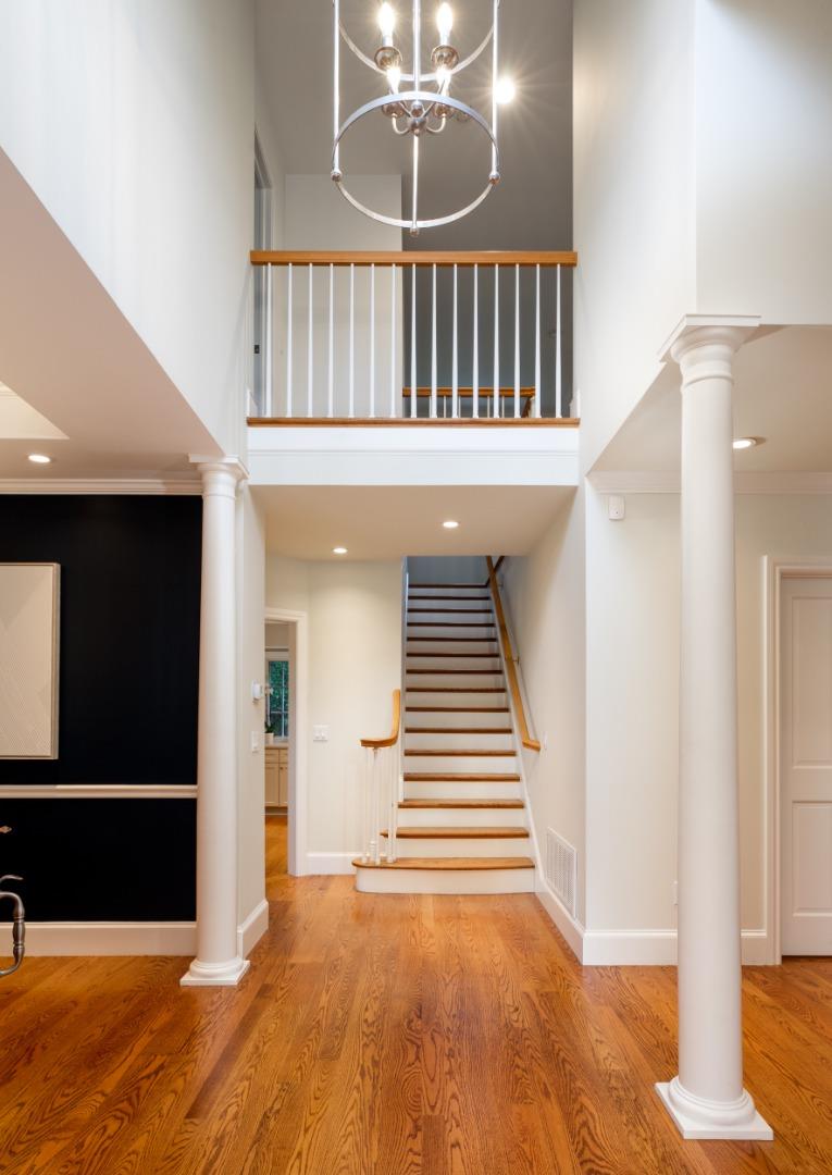 166 Seminary Drive Menlo Park, CA 94025 - Photo 6 of 41 a view of a hallway with entryway wooden floor and front door