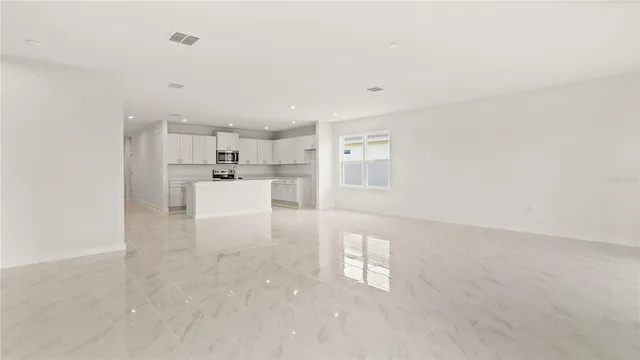 a view of a kitchen with a sink