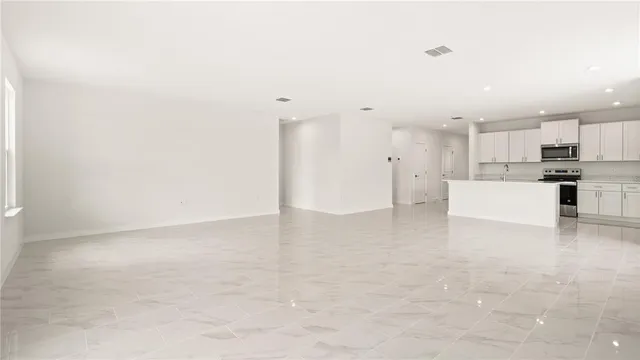 a view of a kitchen with a sink