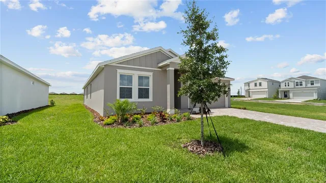 a house view with a garden space