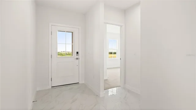 an empty room with windows