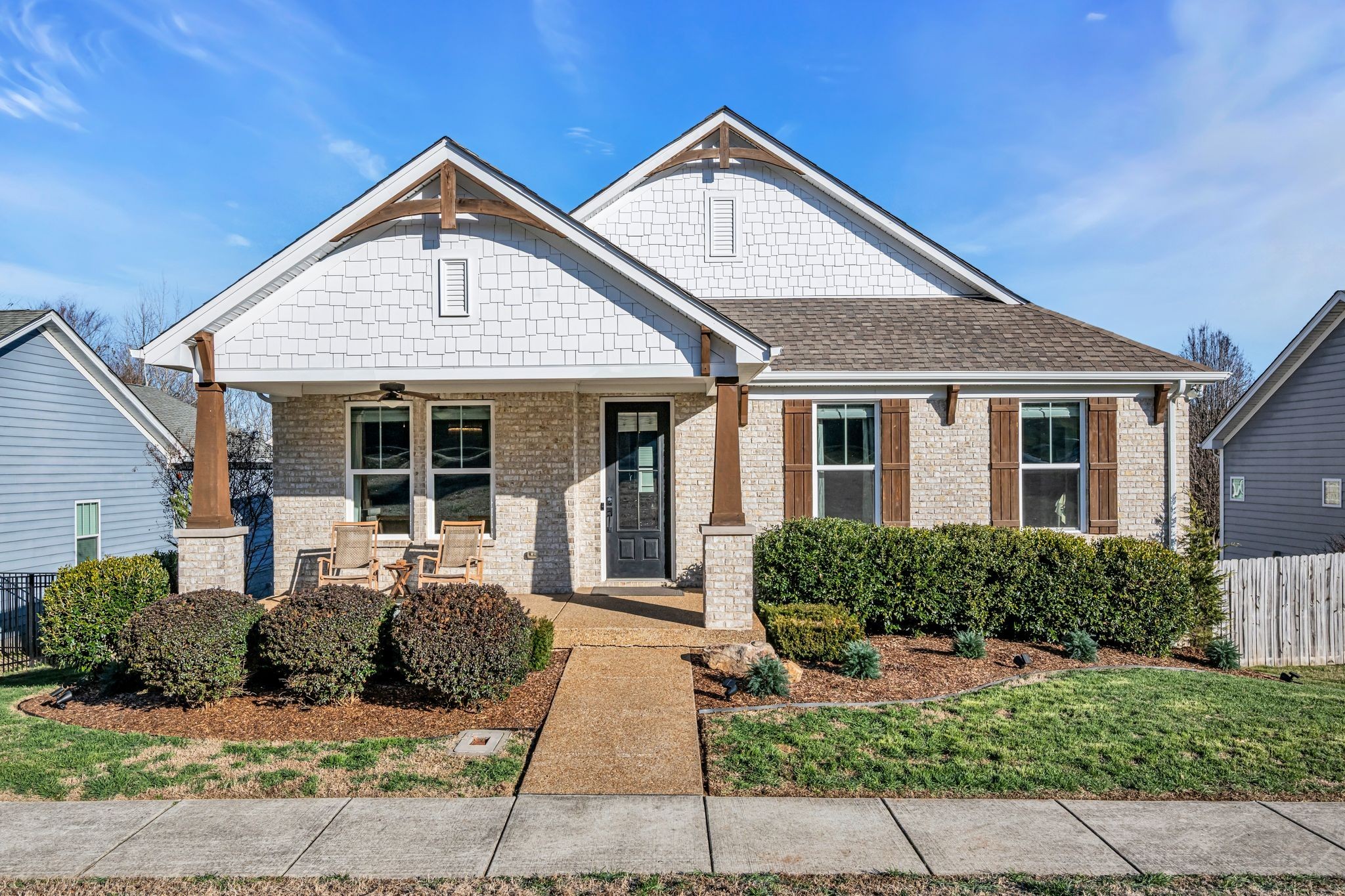 111 Ellersly Way Kingston Springs, TN 37082 - Photo 1 of 46 a front view of a house with a garden