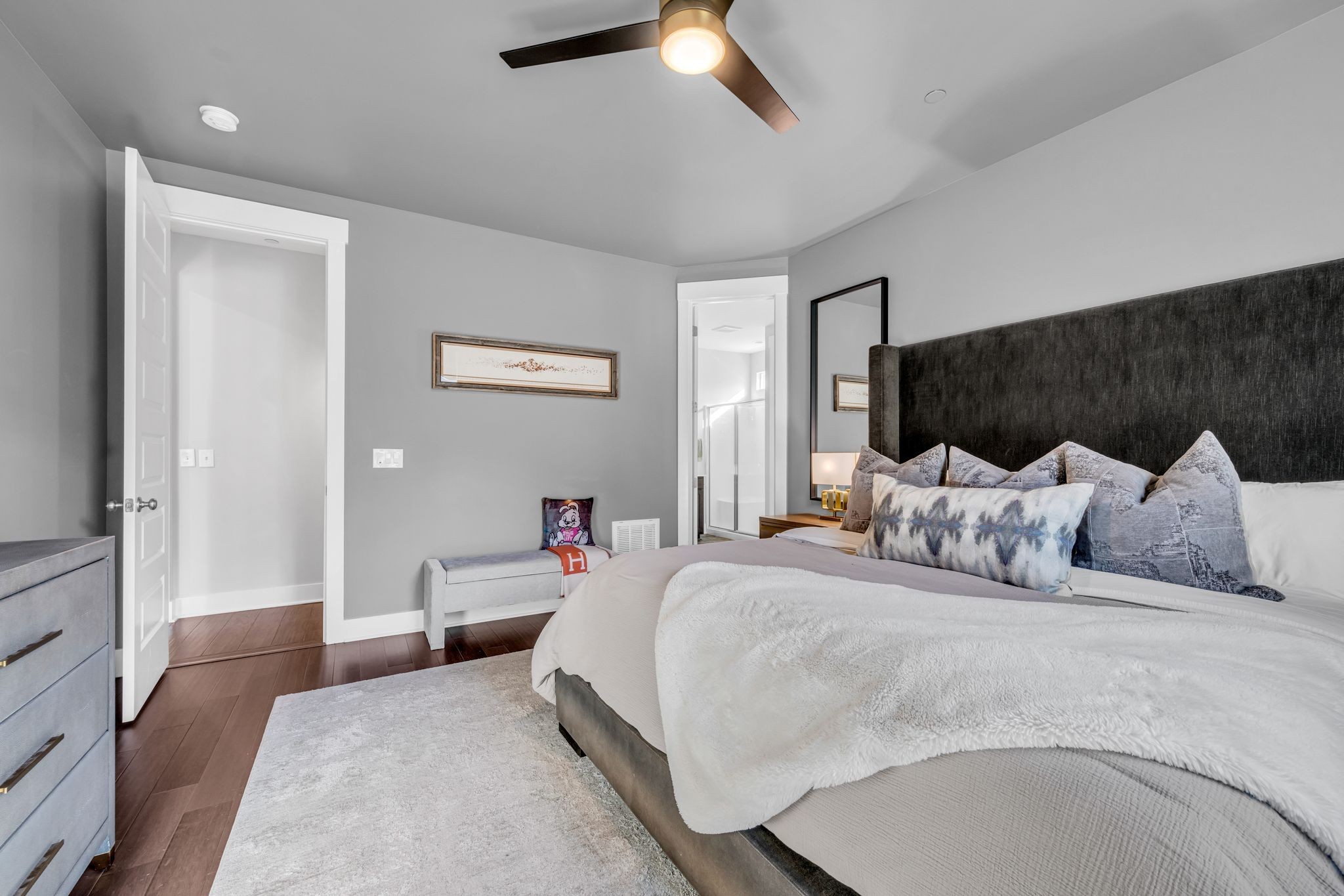 111 Ellersly Way Kingston Springs, TN 37082 - Photo 22 of 46 a bedroom with bed and a chandelier