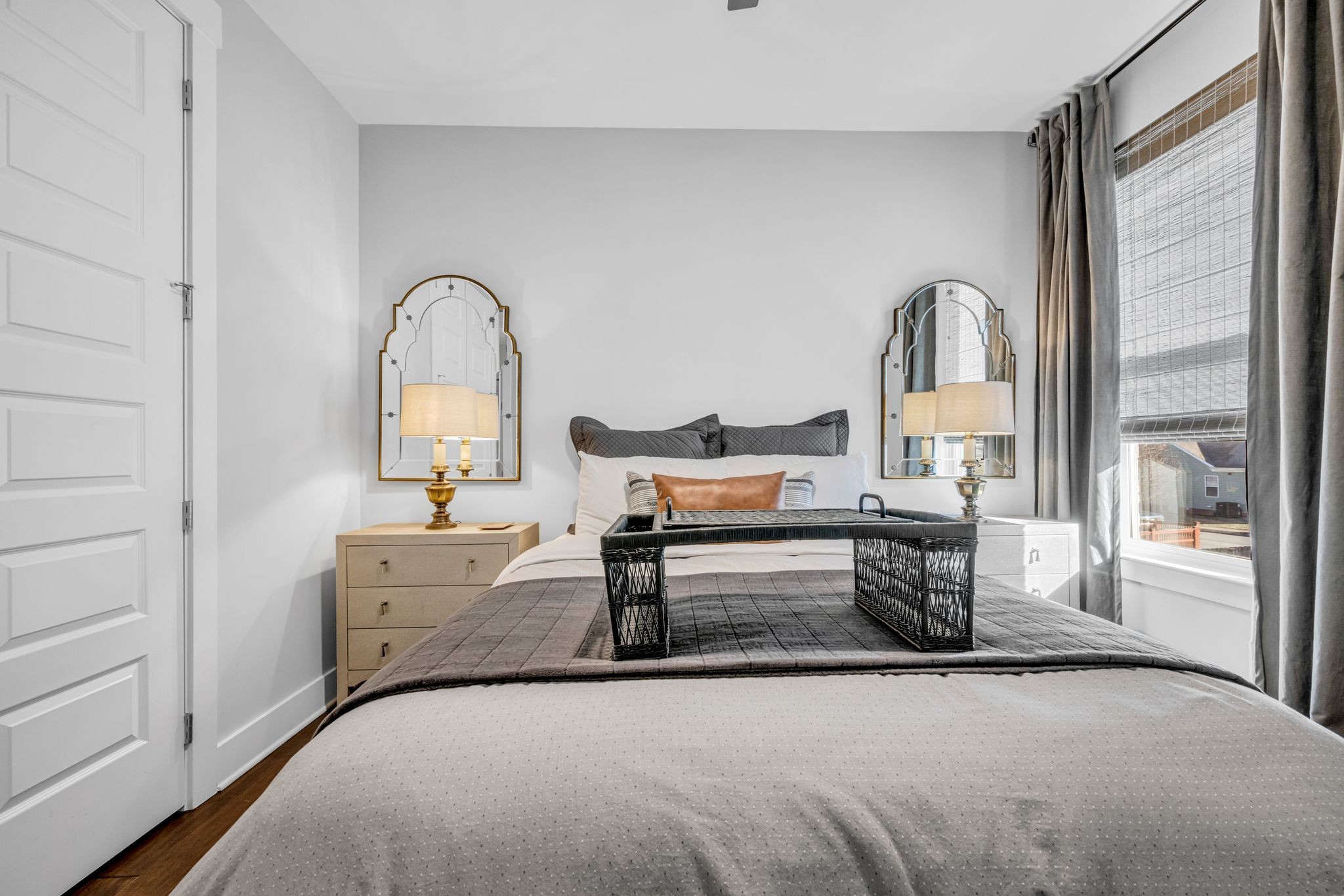 111 Ellersly Way Kingston Springs, TN 37082 - Photo 27 of 46 a bedroom with a bed and a dresser with mirror