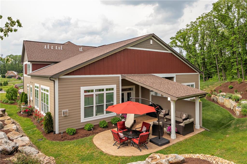 100 Meadow Road Irwin, PA 15642 - Photo 13 of 25 Professional Landscaping, Covered Rear Patio, and Privacy Border in this Very Private Backyard Oasis!