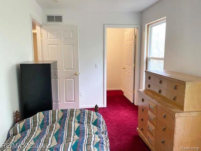 2800 Wixom Road Commerce Township, MI 48382 - Photo 21 of 38 3rd bedroom upper with walk-in closet