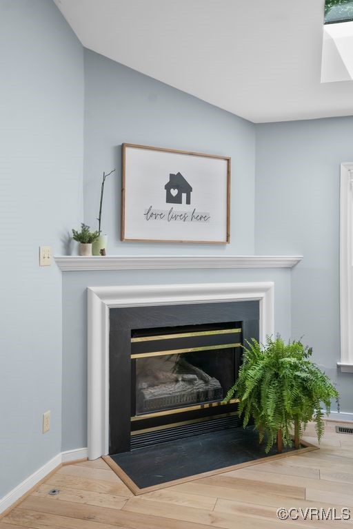 15300 Houndmaster Circle Midlothian, VA 23112 - Photo 13 of 48 a living room with a fireplace and potted plant