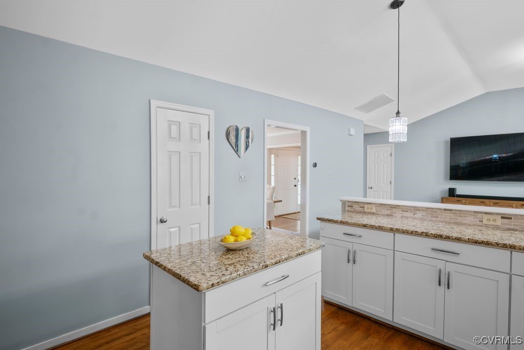 15300 Houndmaster Circle Midlothian, VA 23112 - Photo 18 of 48 a kitchen with a granite countertop cabinets and white appliances