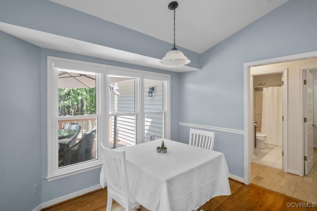 15300 Houndmaster Circle Midlothian, VA 23112 - Photo 20 of 48 a view of a dining room with furniture window and outside view