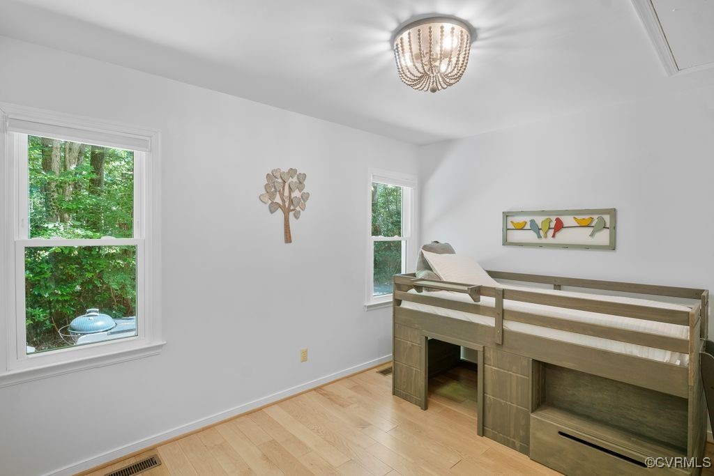 15300 Houndmaster Circle Midlothian, VA 23112 - Photo 22 of 48 a bedroom with a bed and a window