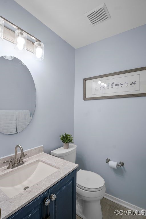 15300 Houndmaster Circle Midlothian, VA 23112 - Photo 34 of 48 a bathroom with a granite countertop sink and a mirror