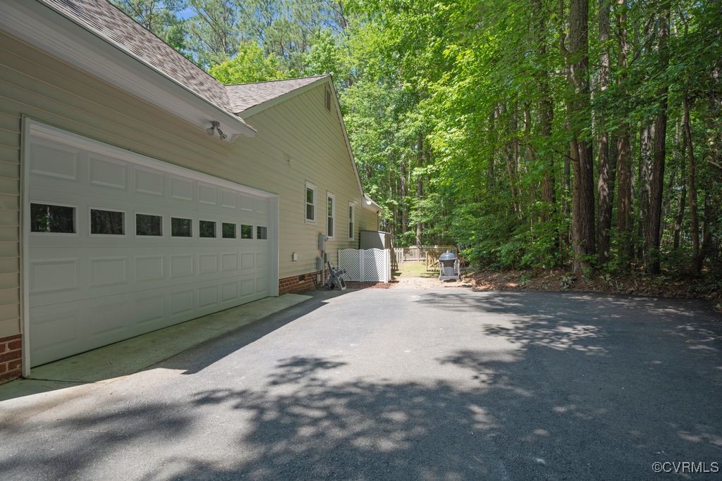 15300 Houndmaster Circle Midlothian, VA 23112 - Photo 35 of 48 a view of a house with a street