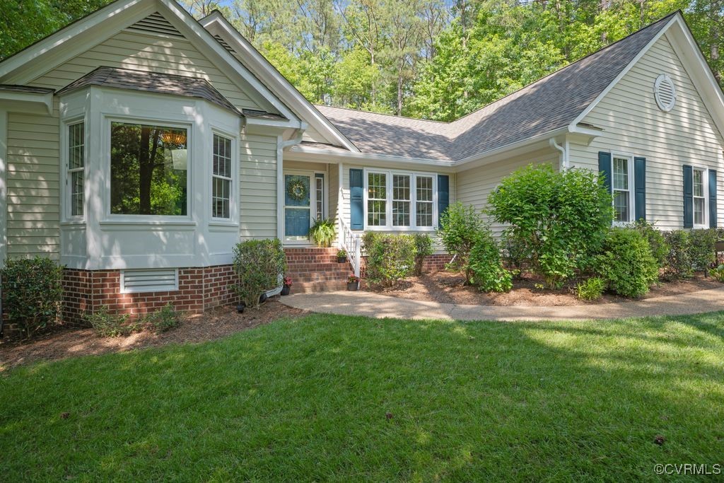 15300 Houndmaster Circle Midlothian, VA 23112 - Photo 4 of 48 front view of a house with a yard