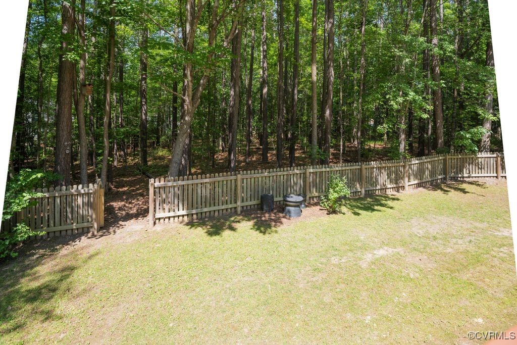 15300 Houndmaster Circle Midlothian, VA 23112 - Photo 45 of 48 a view of small yard with wooden fence