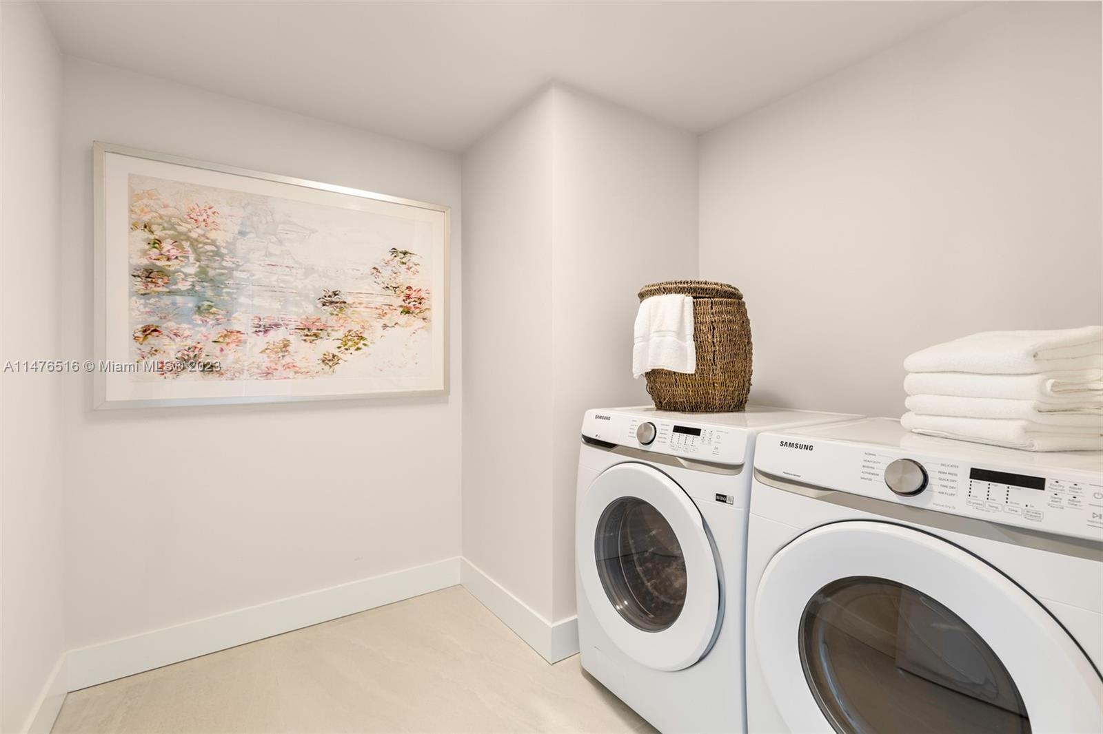 555 Northeast 34th Street, Unit PH5 Miami, FL 33137 - Photo 21 of 29 a view of livingroom with washer and dryer