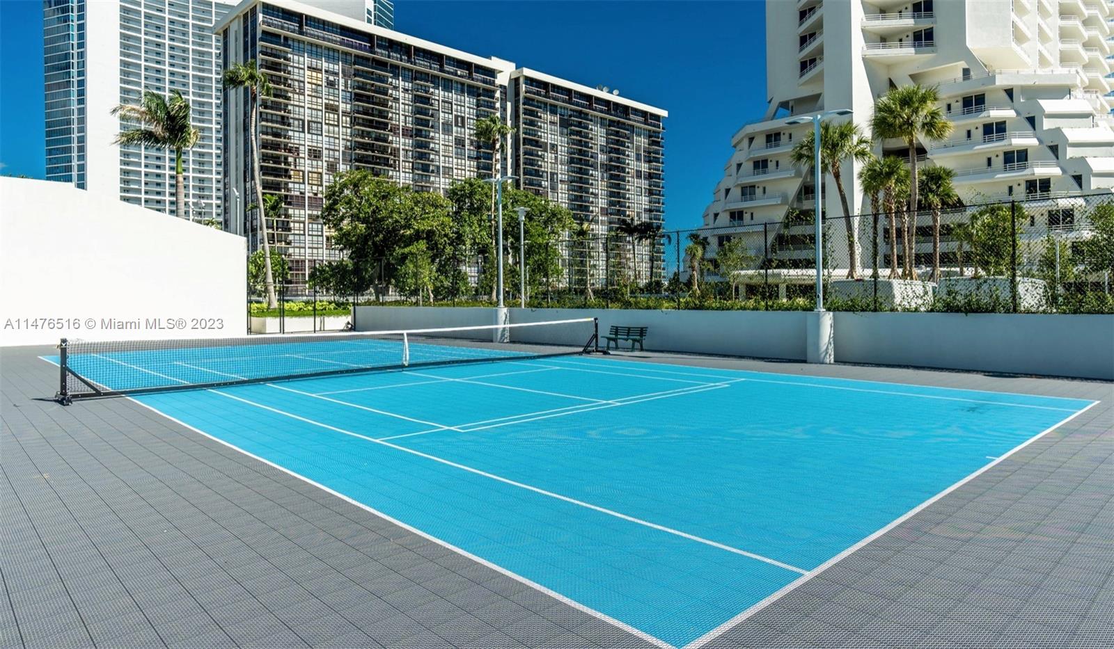 555 Northeast 34th Street, Unit PH5 Miami, FL 33137 - Photo 29 of 29 a view of a tennis court