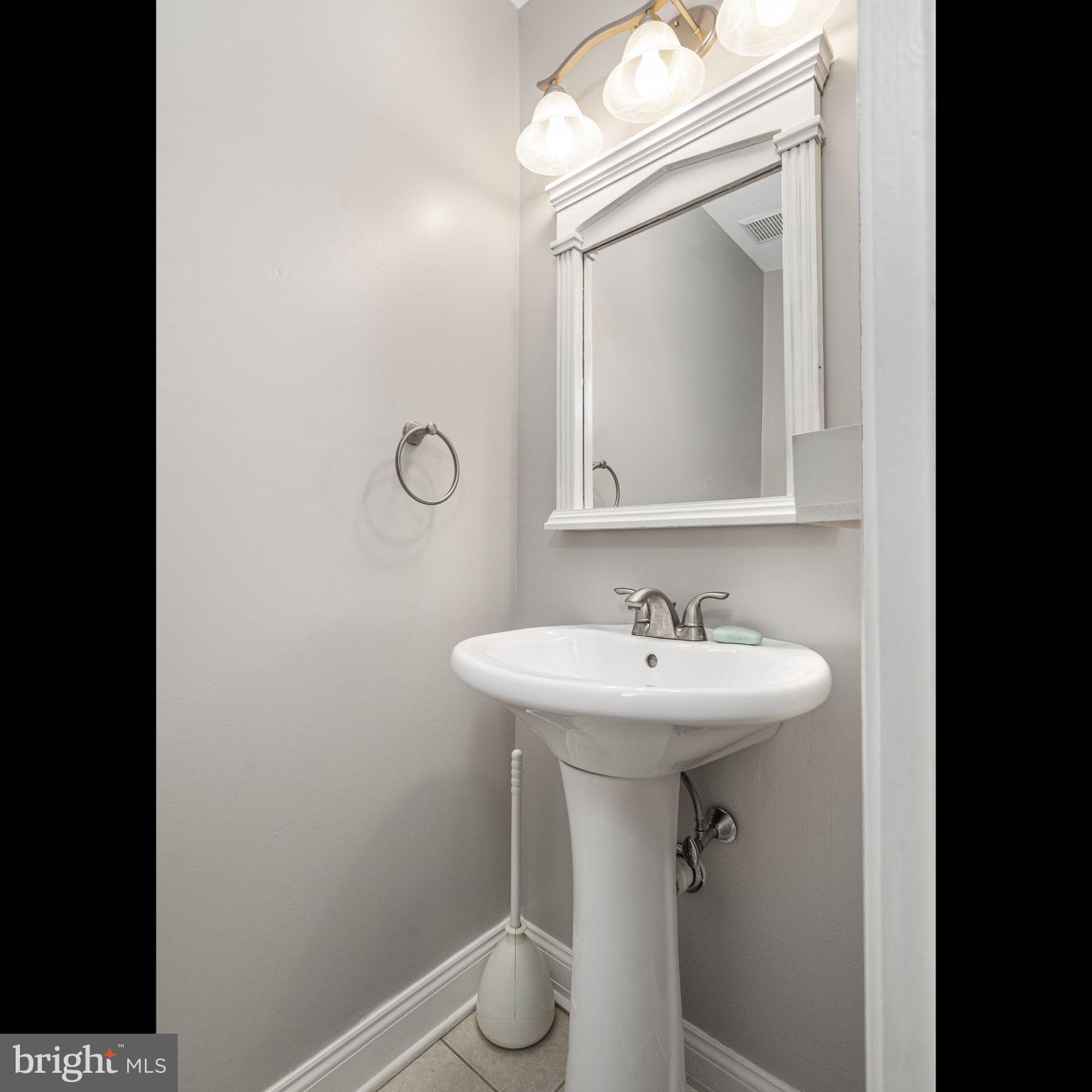 113 Talgrath Court Exton, PA 19341 - Photo 13 of 25 a bathroom with a sink and mirror