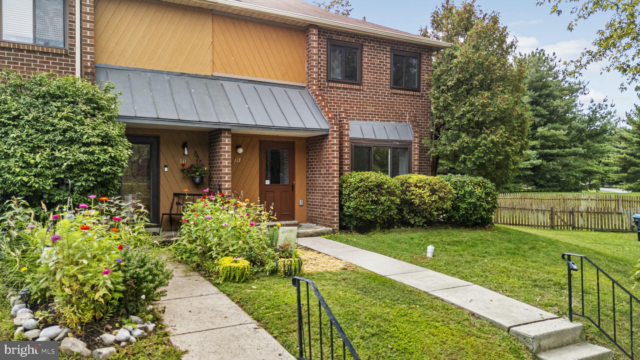 113 Talgrath Court Exton, PA 19341 - Photo 2 of 25 a view of a house with potted plants and large tree