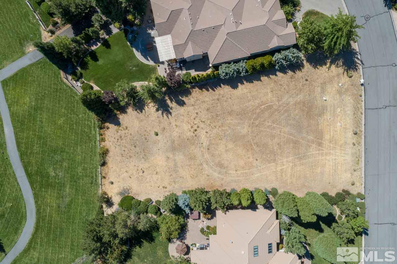 4535 Mountaingate Drive Reno, NV 89519 - Photo 3 of 5 an aerial view of a residential houses with outdoor space and trees all around