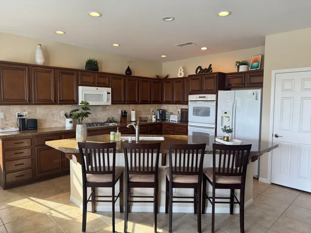 a bedroom with a bed and a tv