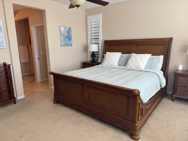 a bathroom with a sink a mirror and shower