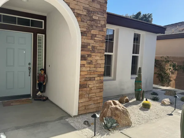 a view of a house with patio