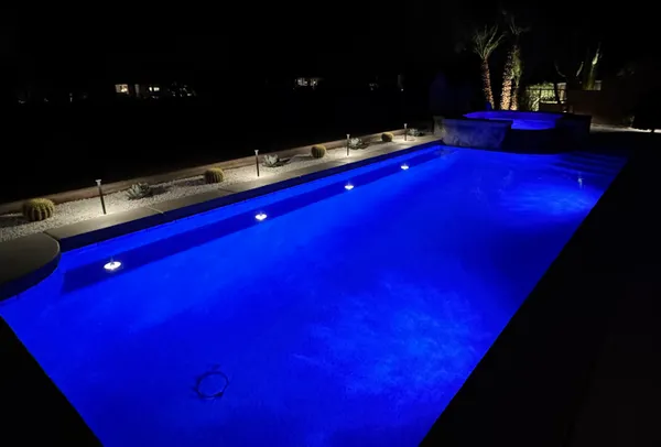 a view of a chairs and table in the patio