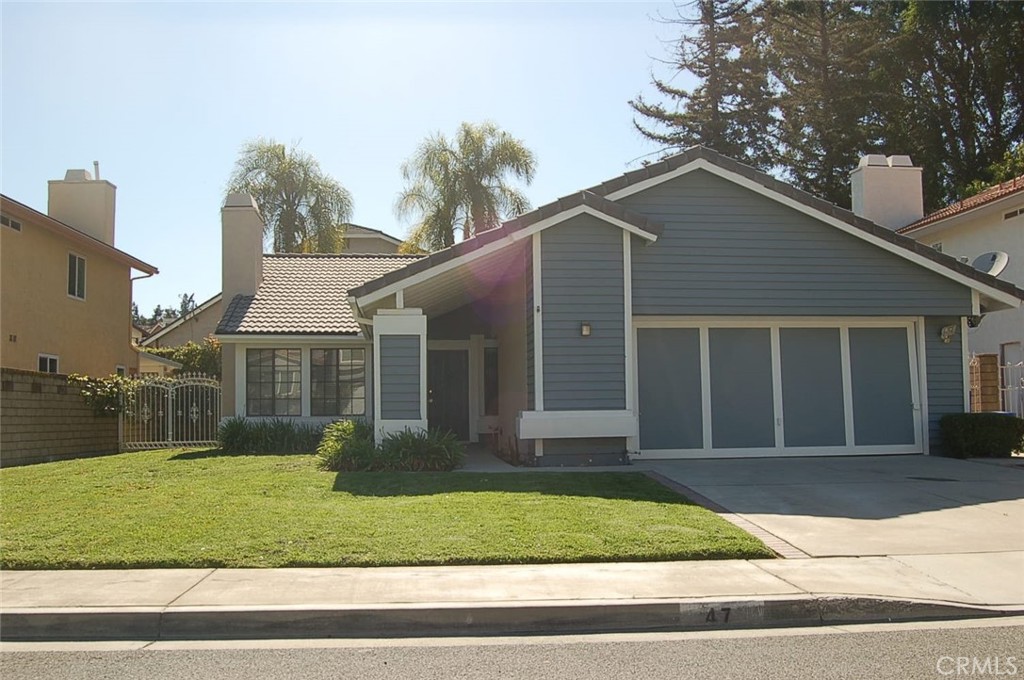 front view of a house and a yard