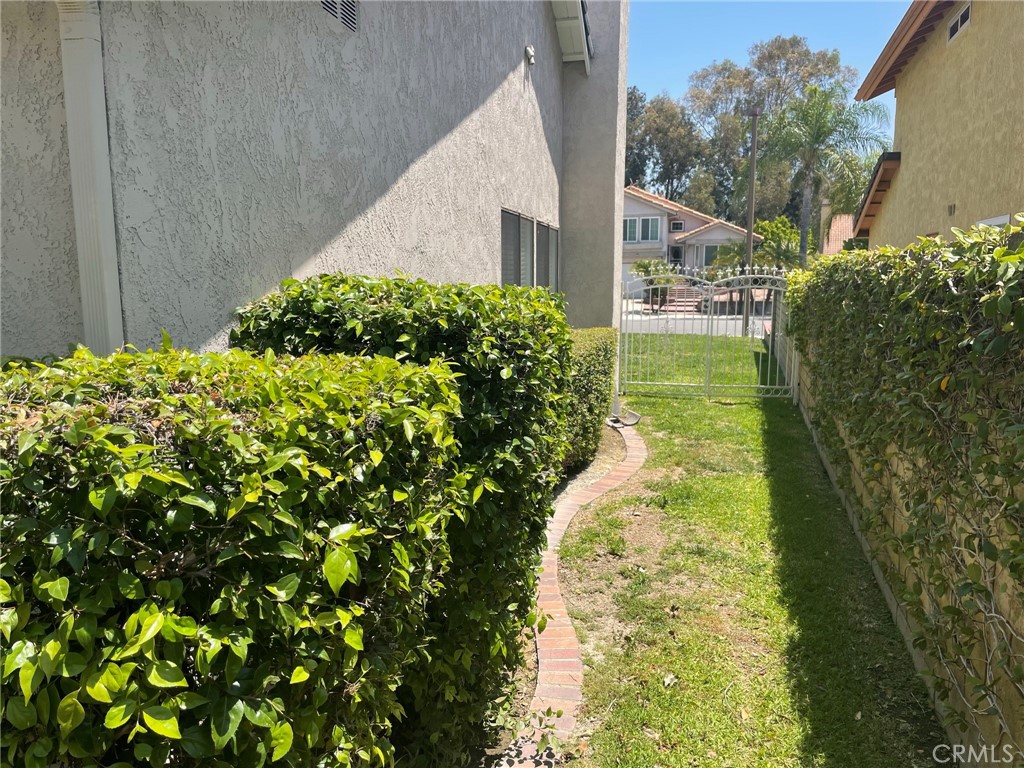 47 Deer Creek Road Phillips Ranch, CA 91766 - Photo 23 of 24 a backyard of a house with lots of green space
