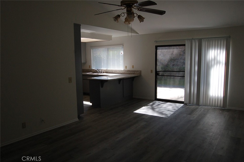 47 Deer Creek Road Phillips Ranch, CA 91766 - Photo 9 of 24 a kitchen with kitchen island stainless steel appliances a sink stove and cabinets