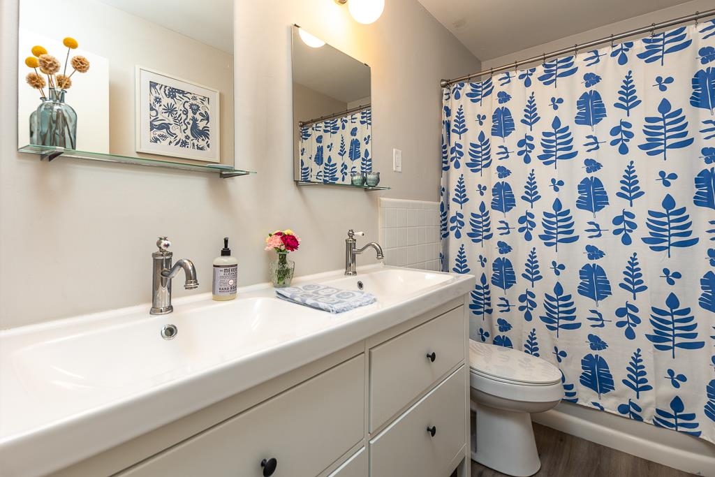 2662 Elmore Park Road Bartlett, TN 38134 - Photo 20 of 28 a bathroom with a sink and a mirror