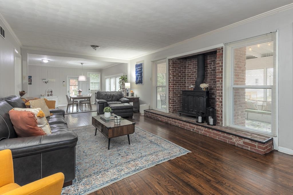2662 Elmore Park Road Bartlett, TN 38134 - Photo 5 of 28 a living room with furniture and a fireplace