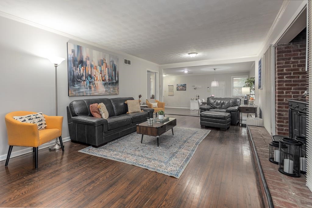 2662 Elmore Park Road Bartlett, TN 38134 - Photo 6 of 28 a living room with furniture and a wooden floor