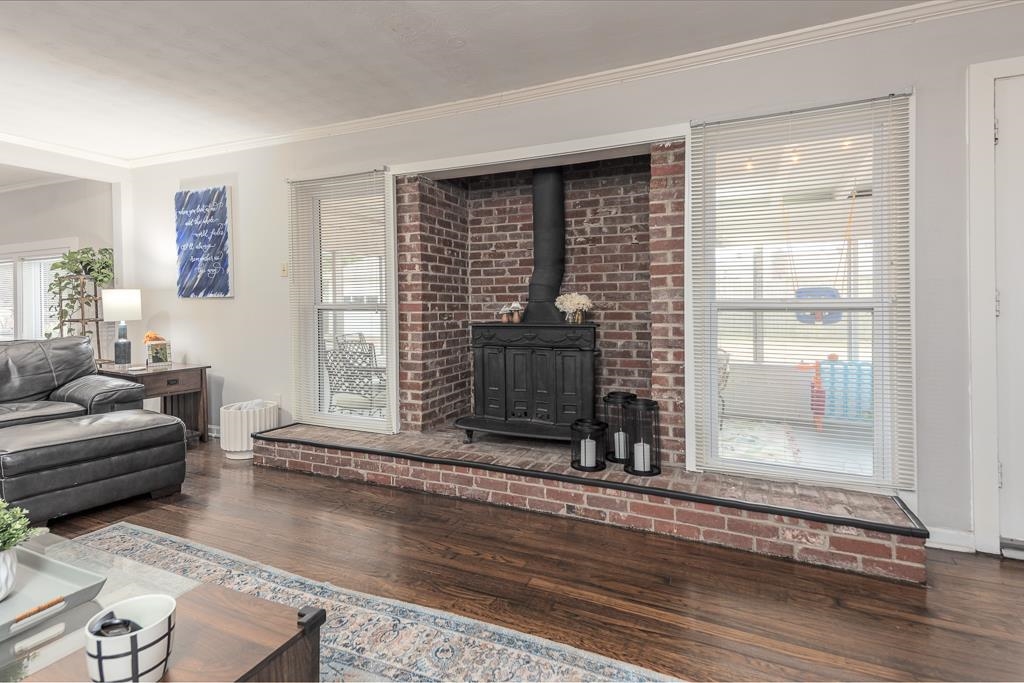 2662 Elmore Park Road Bartlett, TN 38134 - Photo 8 of 28 a living room with fireplace furniture and wooden floor